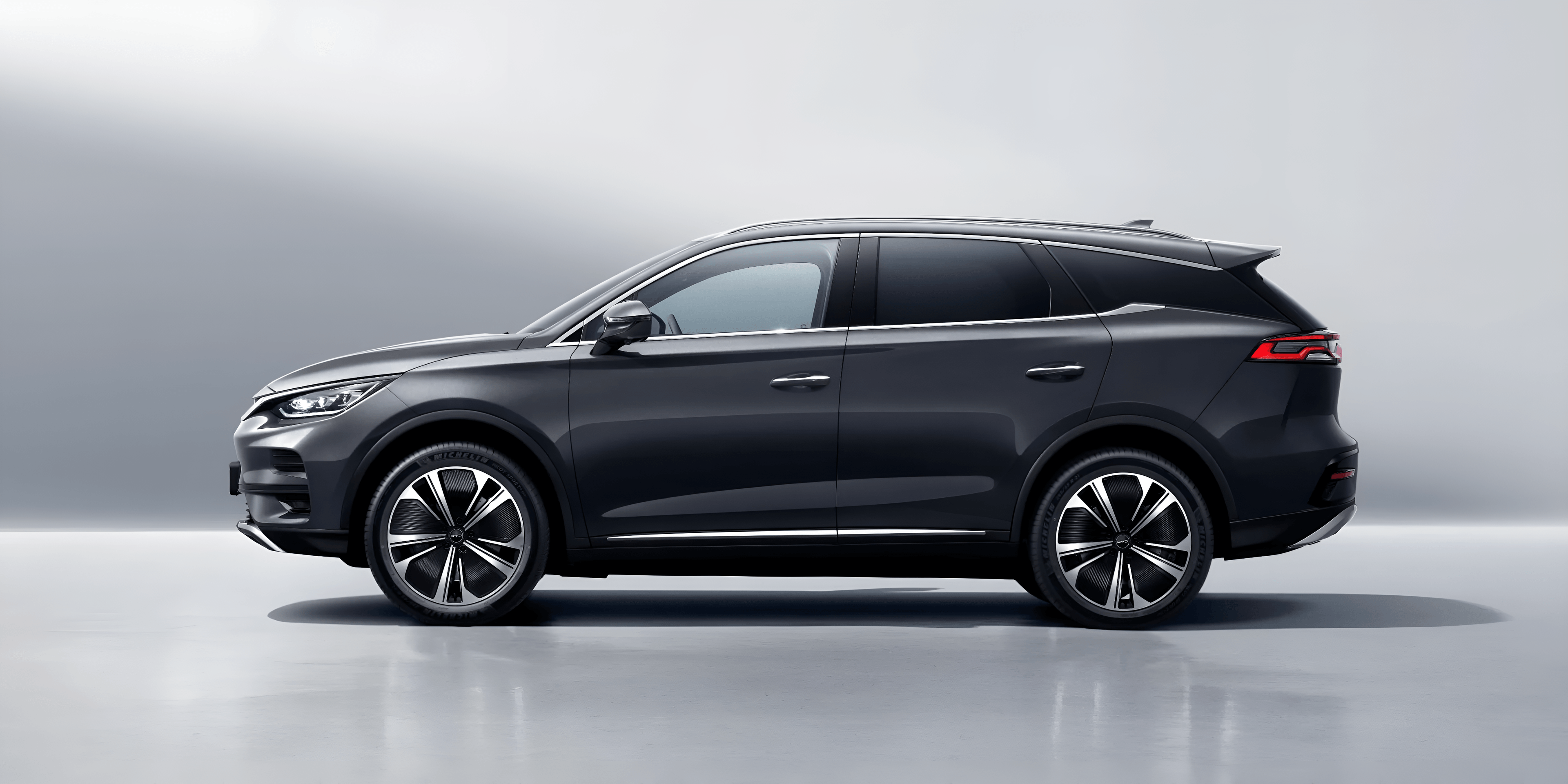 BYD TANG exterior — dragon face design with flowing lines and 21-inch alloy wheels | France AJ Group Ltd